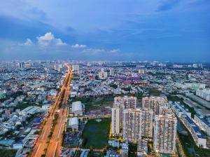 Toàn cảnh khu đô thị Nam Long nhìn từ trên cao về đêm, nằm cạnh tuyến đường lớn kết nối khu vực